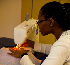 Woman at sewing machine